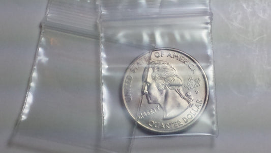 Clear resealable bags from Original Apple Bags, 1.25 x 1.25 inches, perfect for storage and organization.