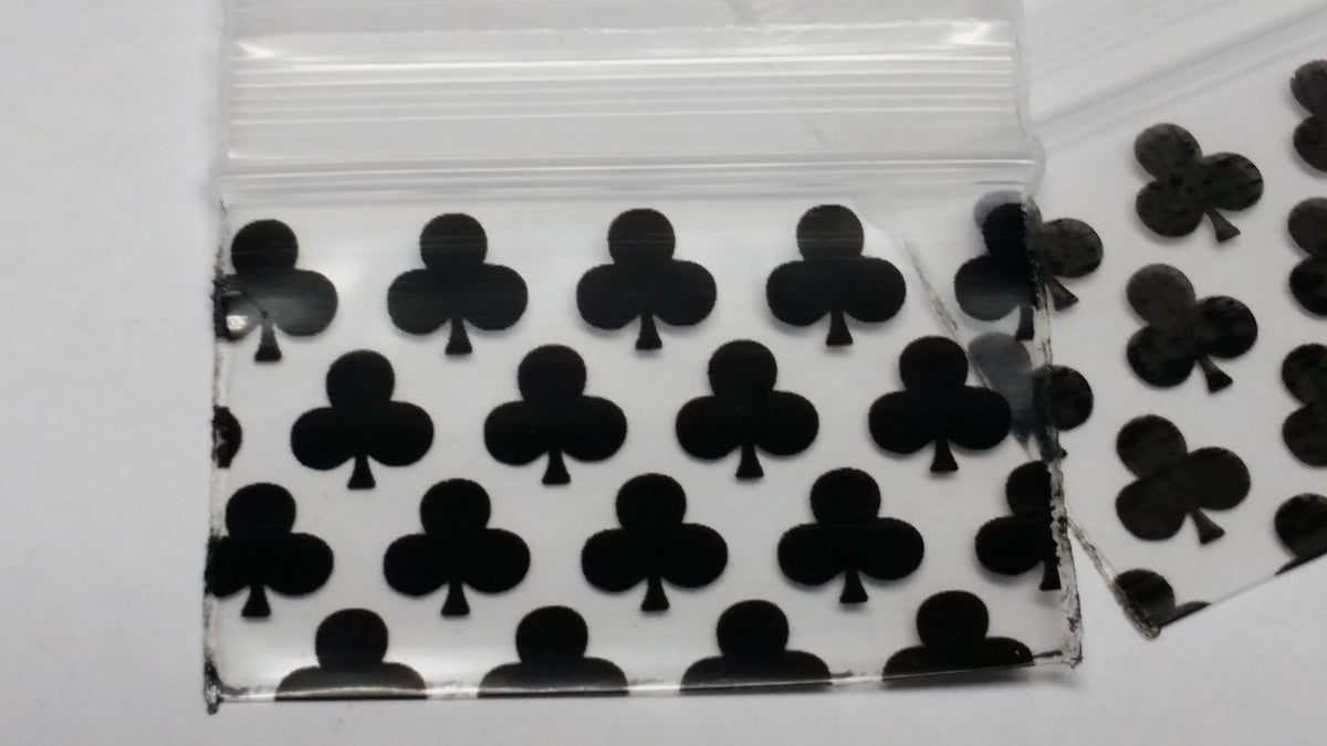 Original Apple Bags resealable bags with 1.5x1 inch club design, ideal for storing small items or craft supplies.