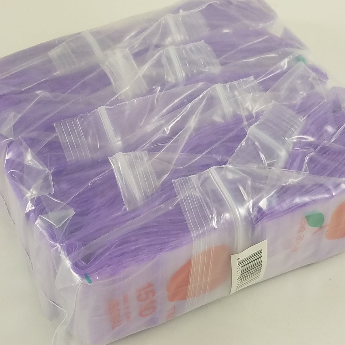 Purple 1510 Original Apple Bags resealable bags, 1.5" x 1", designed for secure storage and packaging.