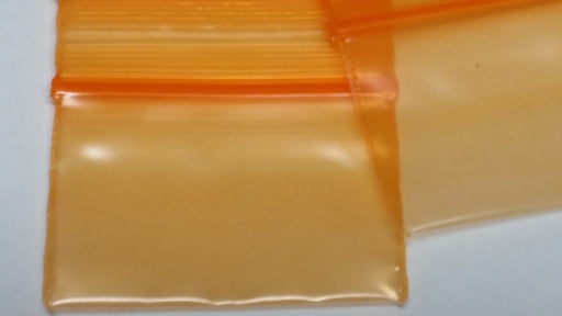 1510 Original Mini Ziplock 2.5mil Plastic Bags 1.5" x 1" Reclosable Baggies (Orange) - The Baggie Store
