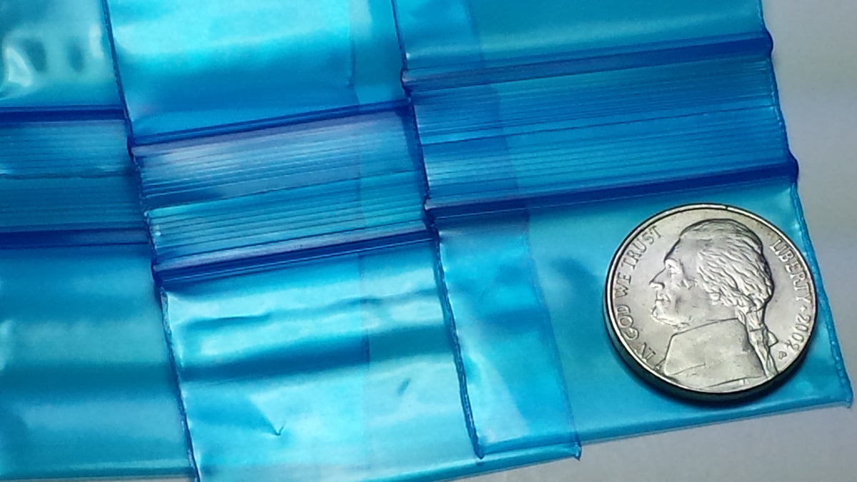 Blue 1.5" x 1" resealable Apple Bags by Original Apple Bags, designed for secure storage and packaging.