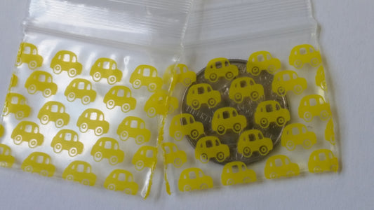 Resealable Apple Bags from Original Apple Bags, 1.5" x 1.25", in taxi cab yellow color, suitable for packaging small items.