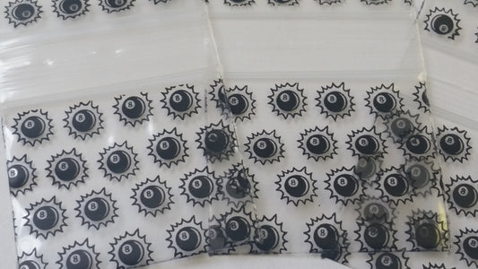 Original Apple Bags resealable bags with Eight Ball design, measuring 1.5" x 1.25", suitable for storing small items.