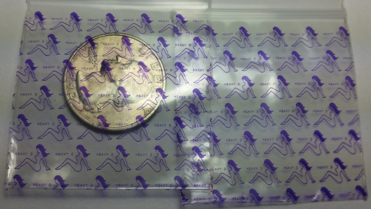 Original Apple Bags resealable bags with gold skull design, 1.75 x 1.75 inches, ideal for packaging or storage.