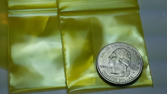 Blue resealable Original Apple Bags, 1.75 x 1.75 inches, shown with clear zipper closure for secure storage.