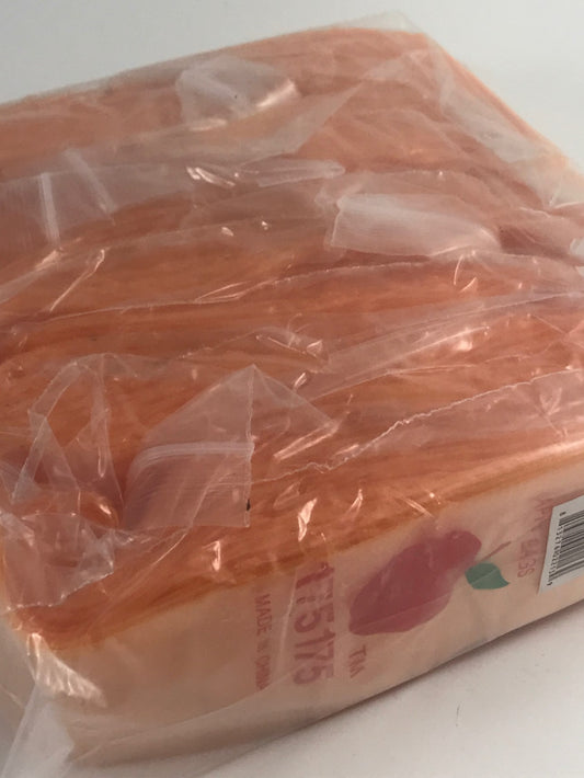 Original Apple Bags resealable bags in orange, 1.75 x 1.75 inches, perfect for packaging small items.
