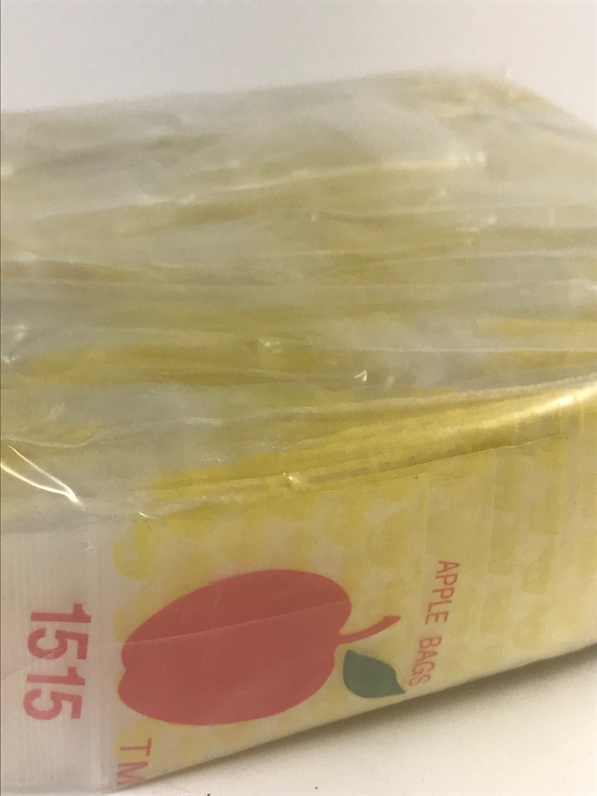 Resealable Original Apple Bags in taxi cab yellow, 1.5" x 1.5" size, perfect for packaging small items or snacks.