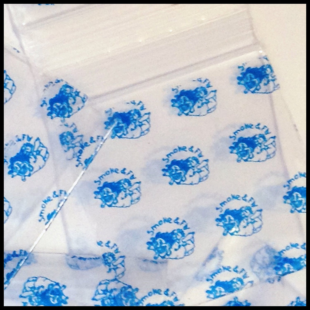 Resealable Original Apple Bags in smoke color, 1.5 x 1.5 inches, designed for storing small items or products.