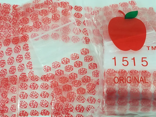 Red dice-shaped resealable bags from Original Apple Bags, 1.5 x 1.5 inches, ideal for packaging small items.