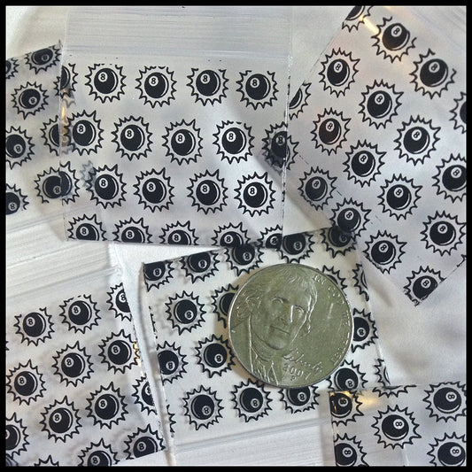 Set of eight resealable Original Apple Bags with 1.5-inch diameter, featuring an 8 ball design for packaging or storage.