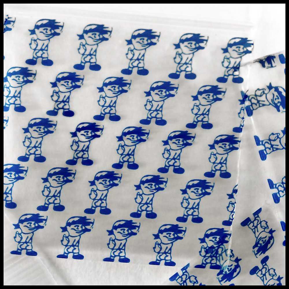 Blue boy-shaped bag from Original Apple Bags, 5/8" x 5/8" size, made of durable material for gift or storage purposes.
