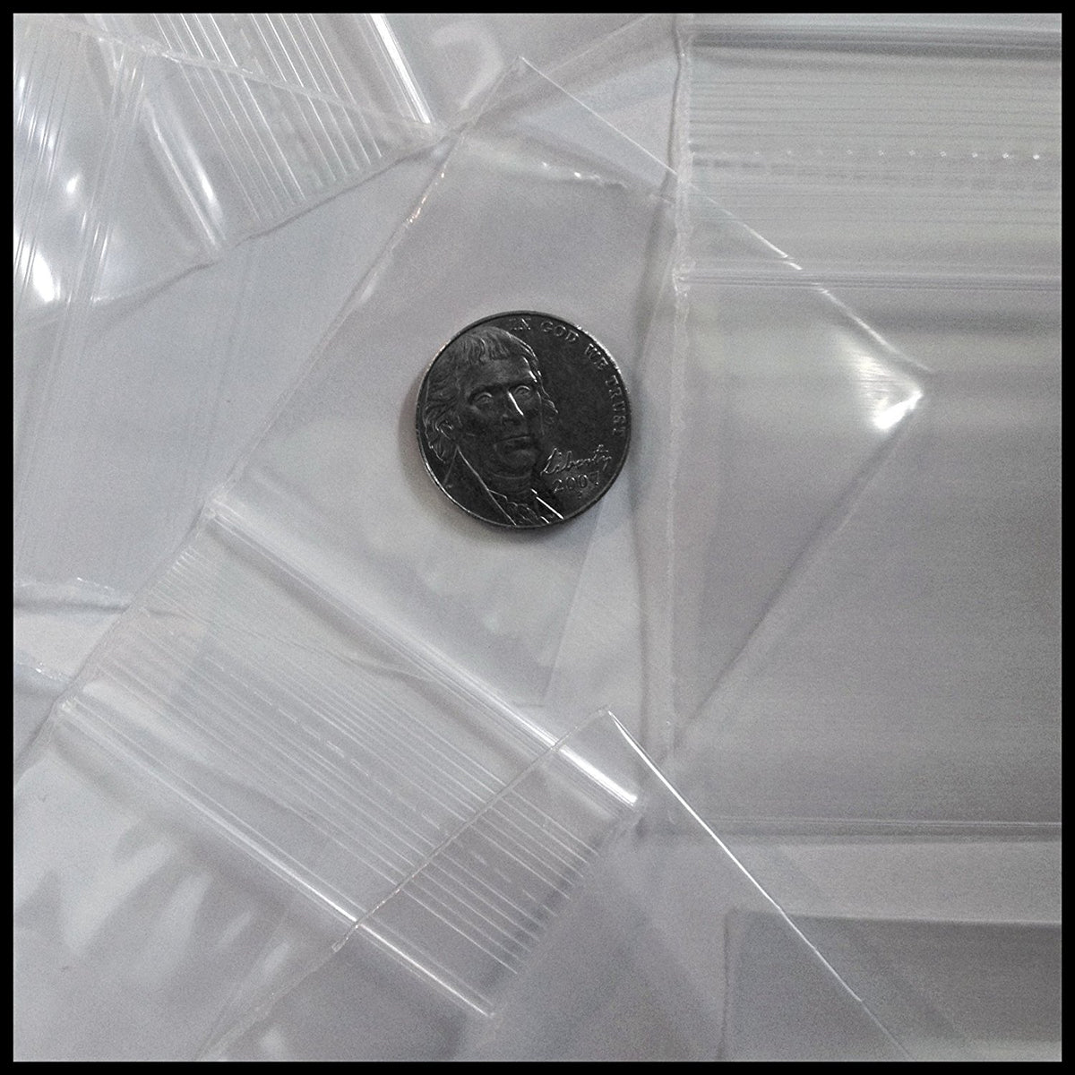 Clear white 5858 Original Apple Bags measuring 5/8 inch by 5/8 inch, shown flat on a white background.