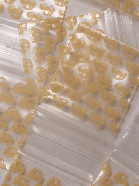 Original Apple Bags resealable bags in taxi cab design, 1.5" x 1.75", perfect for storing small items or snacks.