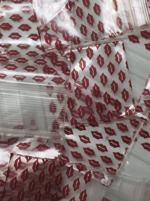 Original Apple Bags resealable bags with lip closure, measuring 1.5 x 1.75 inches, ideal for storing small items.