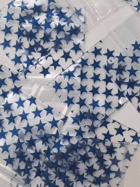 Blue stars resealable Original Apple Bags, 1.5 x 1.75 inches, designed for storing small items securely.