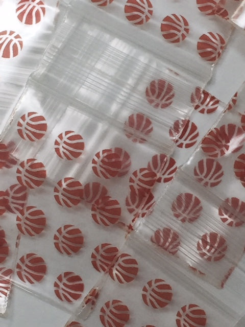 Resealable Original Apple Bags basketball-themed snack bags, 1.5 x 1.75 inches, with basketball design for secure storage.