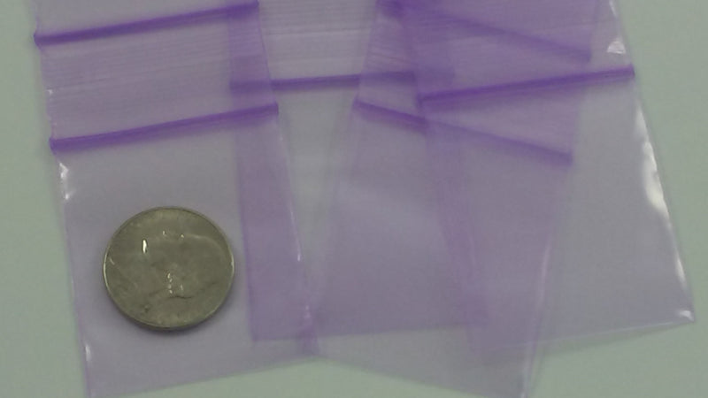 Purple Original Apple Bags resealable bags, 1.5" x 1.75" size, featuring a secure closure and durable material for packaging.