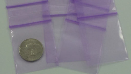 Purple Original Apple Bags resealable bags, 1.5" x 1.75" size, featuring a secure closure and durable material for packaging.