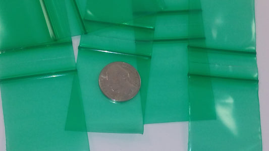 Green resealable Apple Bags by Original Apple Bags, measuring 1.5 x 1.75 inches, shown in a close-up image.