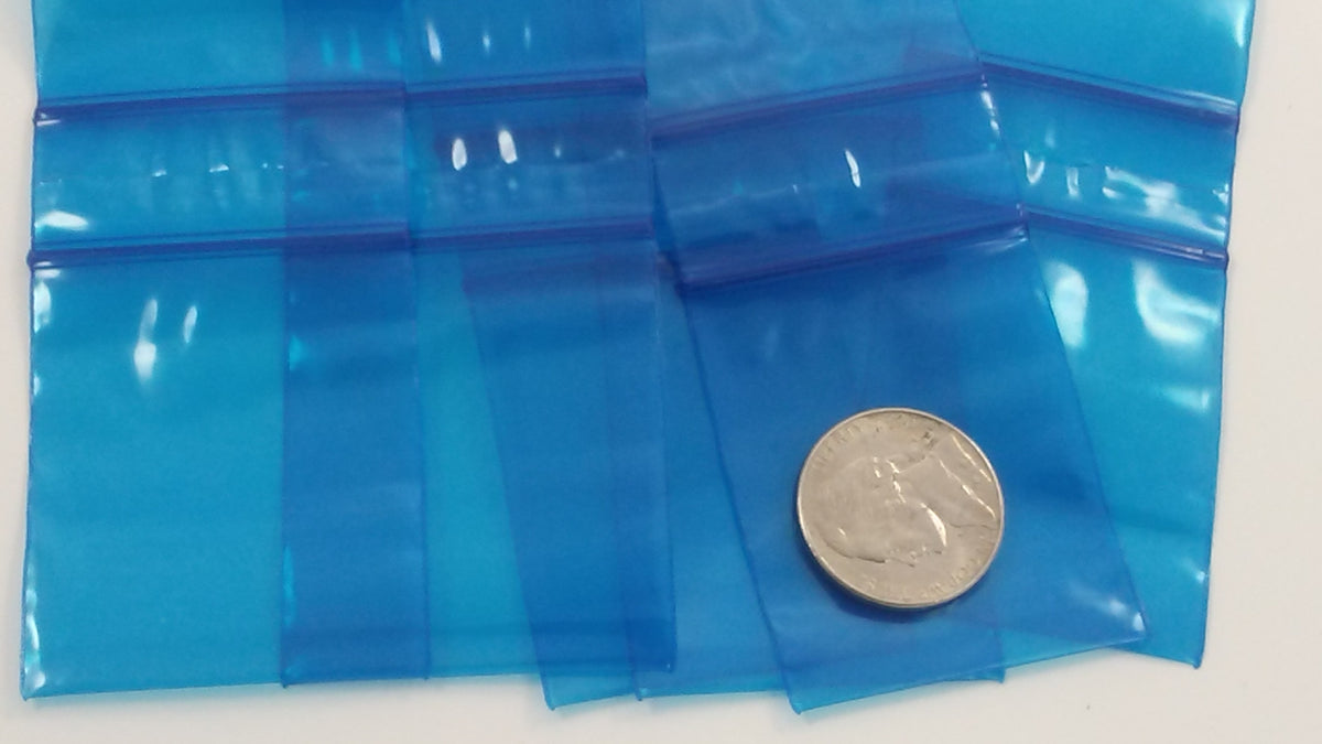Blue resealable bags from Original Apple Bags, 1.5x1.75 inches, shown in a close-up image.