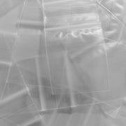 Clear resealable bags from Original Apple Bags, 1.5 x 1.75 inches, perfect for storing small items or packaging.