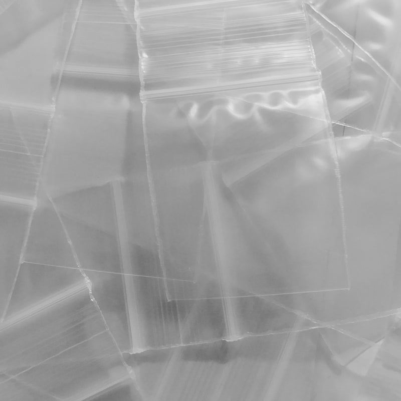 Clear resealable bags from Original Apple Bags, 1.5 x 1.75 inches, perfect for storing small items or packaging.