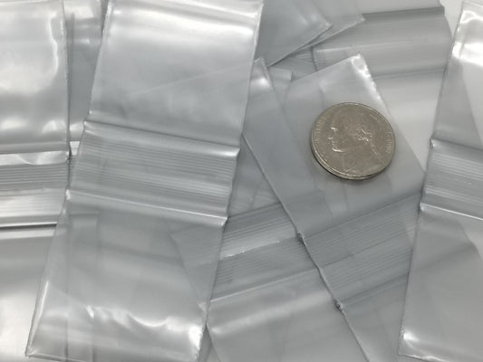 Silver 1.5x1.5-inch resealable apple bags by Original Apple Bags, made of durable material for secure storage.