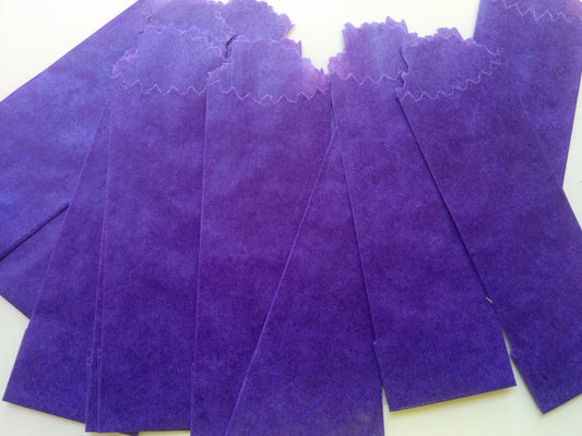 Purple Vellum Glassine Stamp Wax Paper Envelope Bags by Stamp Collectors, moisture-resistant wax bags for stamp storage.