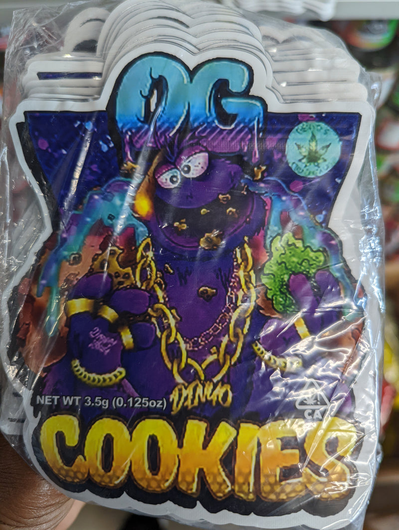 Smell-proof OG Cookies Mylar Bags by The Baggie Store, 50-pack, showing silver foil resealable storage bags for cannabis or snacks.