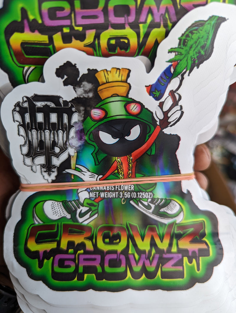 Smell-proof Crowz Growz Mylar bags by The Baggie Store, 50-pack, featuring shiny silver exterior and resealable closure