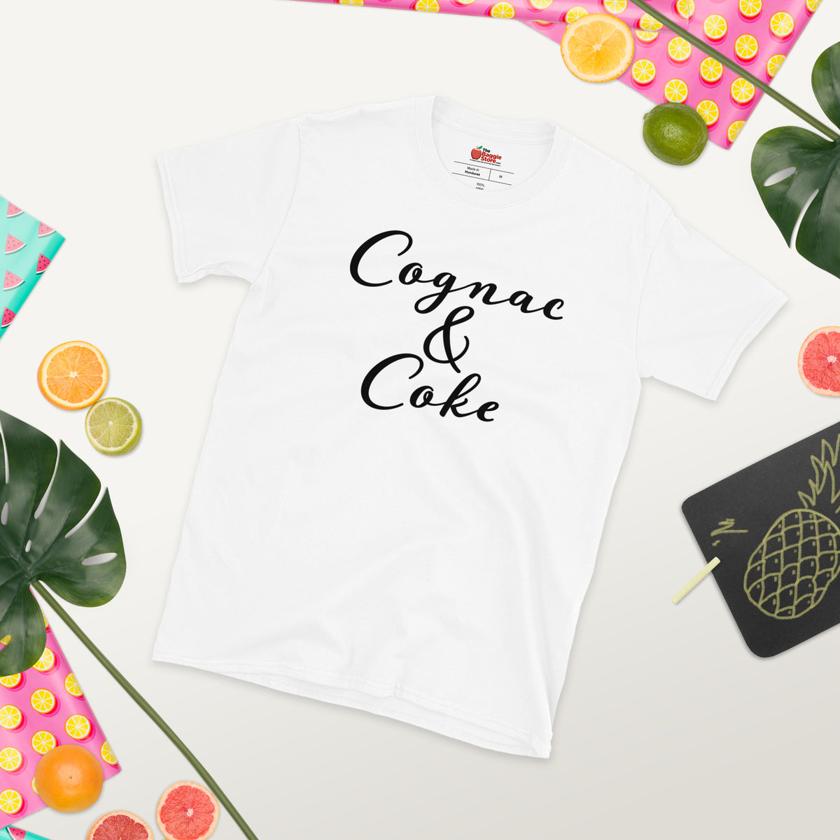 Unisex "Cognac & Coke" short-sleeve T-shirt from The Baggie Store, featuring a stylish graphic print on a casual cotton tee.