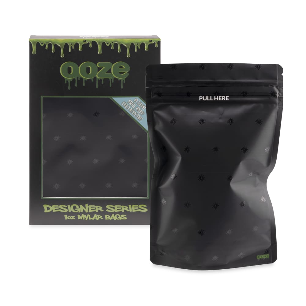 Ooze Designer Series 1-ounce Mylar bag with logo, part of a 10-pack box, featuring a metallic silver finish and secure zip closure.