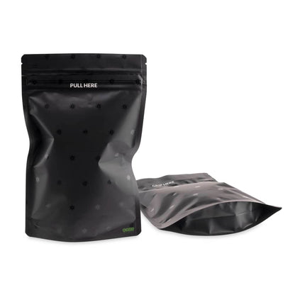 Ooze Designer Series 1 Ounce Mylar Bag 10-pack with logo, featuring metallic finish and resealable zipper for storage.