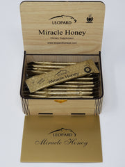 Leopard Miracle Honey dietary supplement jar with honey and herbal ingredients, in a clear glass container.