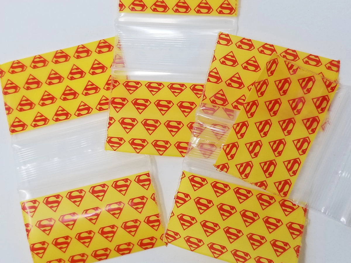 Resealable Original Apple Bags featuring Superman design, durable plastic storage bags for snacks or small items.