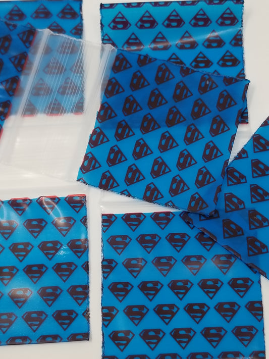 Resealable Original Apple Bags featuring Superman design, made for storing snacks or small items, with colorful superhero graphics.